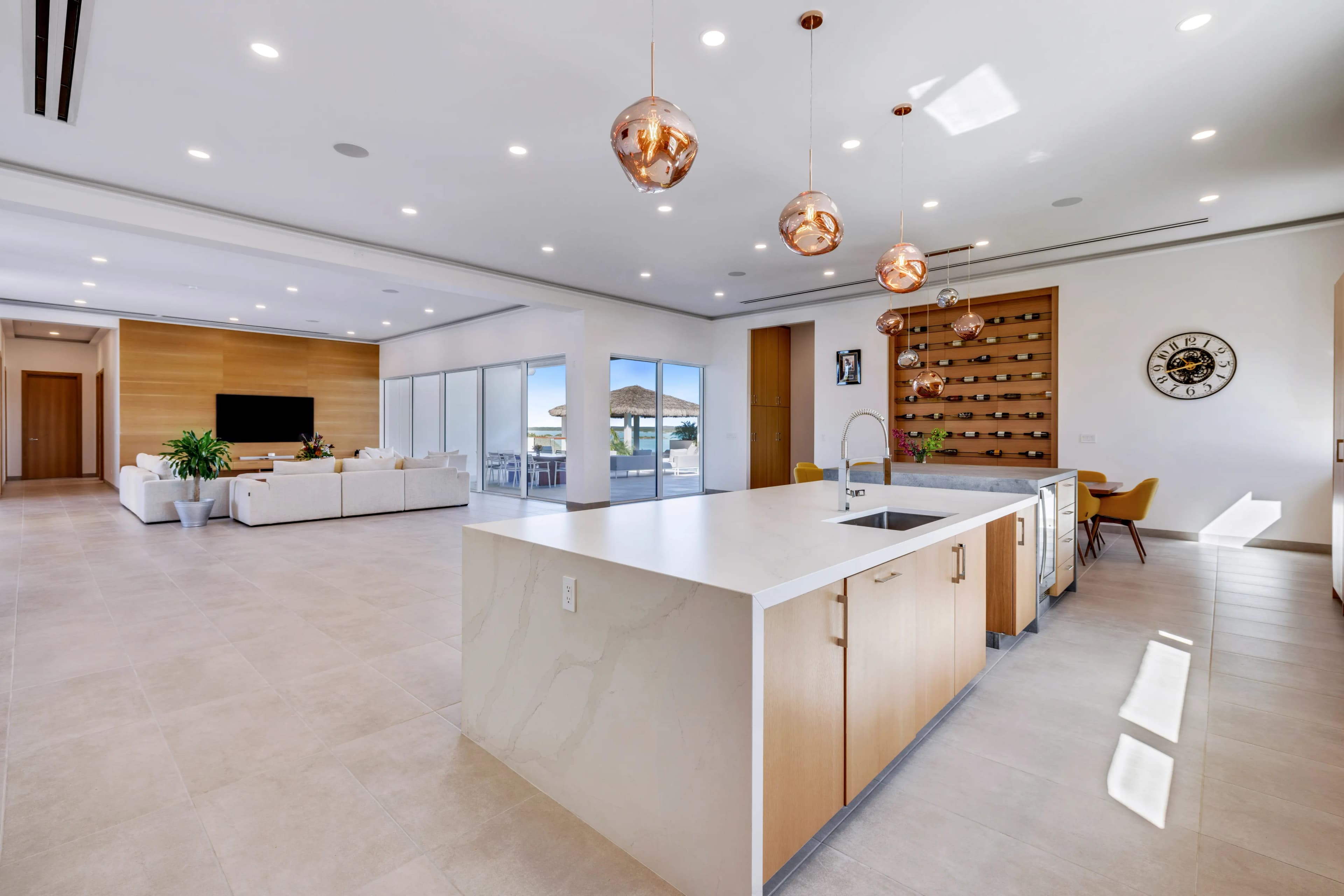 Open great room and kitchen overlooking the water